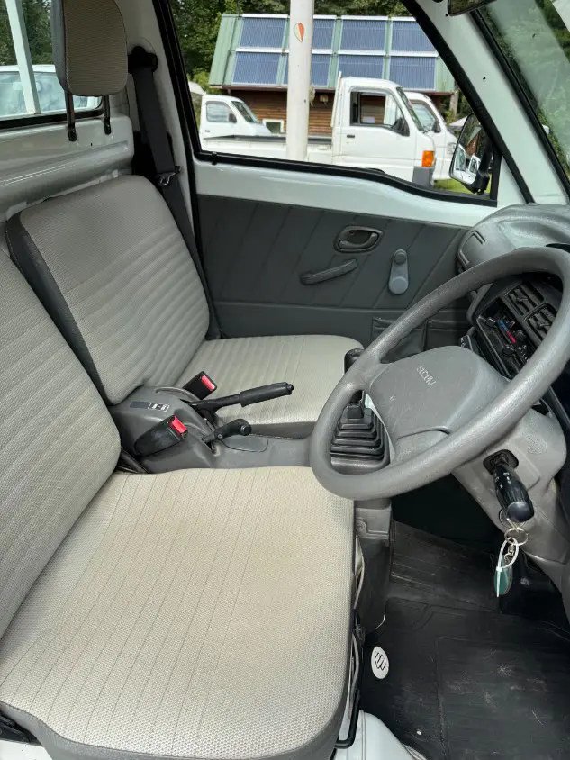 1997 Suzuki Carry 4WD, a white Kei Truck, for sale at Mayberry Mini Trucks in Mount Airy, NC (photo 12 of 18)