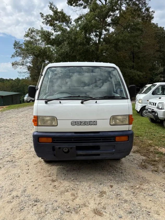 1997 Suzuki Carry 4WD, a white Kei Truck, for sale at Mayberry Mini Trucks in Mount Airy, NC (photo 2 of 18)