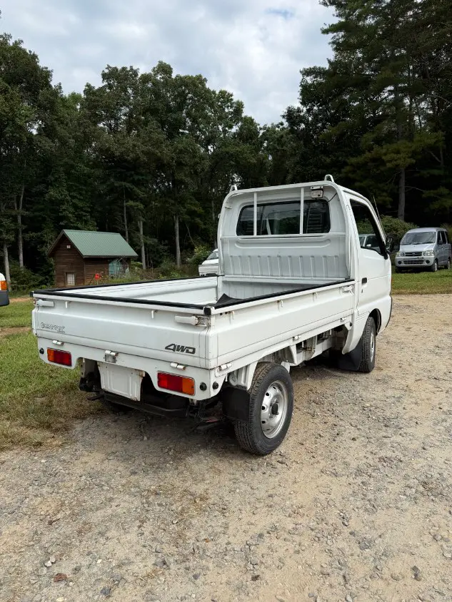 1997 Suzuki Carry 4WD, a white Kei Truck, for sale at Mayberry Mini Trucks in Mount Airy, NC (photo 5 of 18)