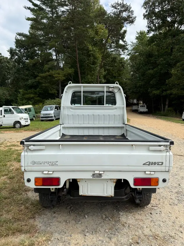 1997 Suzuki Carry 4WD, a white Kei Truck, for sale at Mayberry Mini Trucks in Mount Airy, NC (photo 6 of 18)