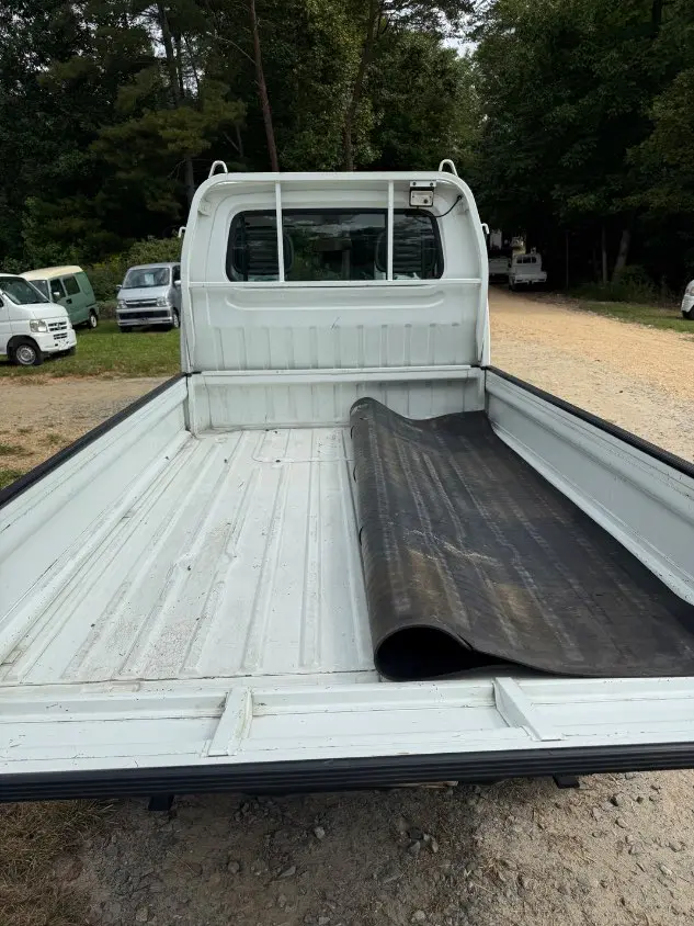 1997 Suzuki Carry 4WD, a white Kei Truck, for sale at Mayberry Mini Trucks in Mount Airy, NC (photo 8 of 18)