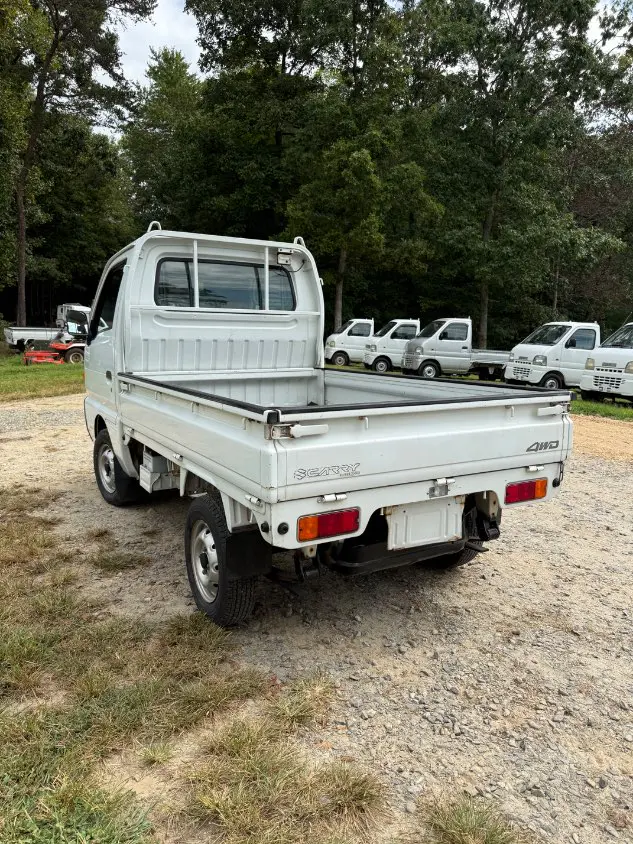 1997 Suzuki Carry 4WD, a white Kei Truck, for sale at Mayberry Mini Trucks in Mount Airy, NC (photo 9 of 18)