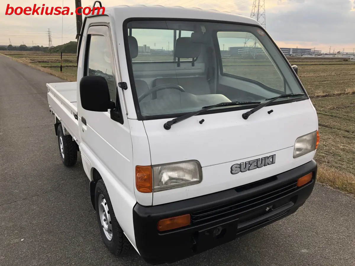 1997 Suzuki Carry 4x4, a white Kei Truck, for sale at Boeki USA in Paterson, NJ (photo 1 of 20)
