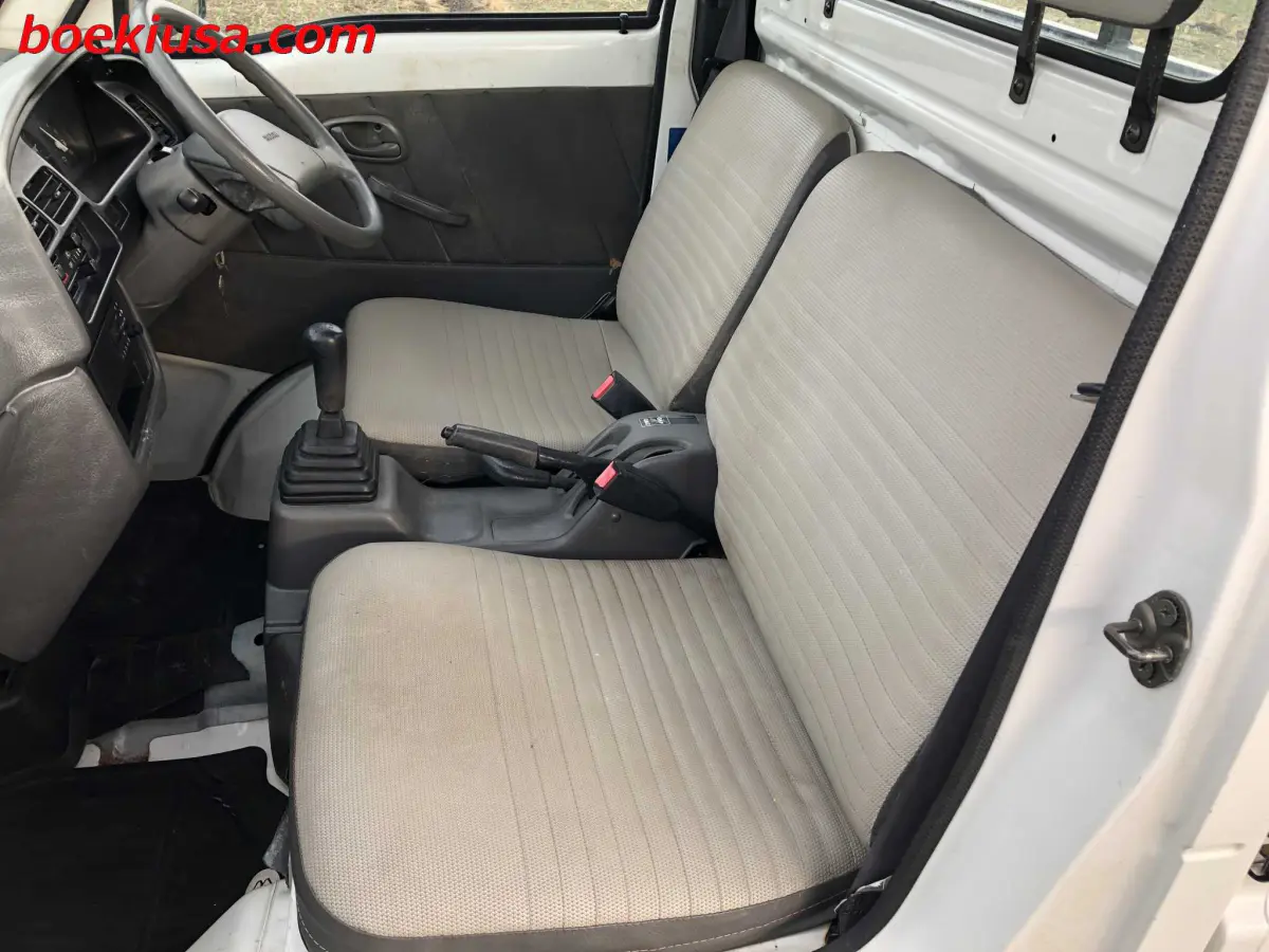 1997 Suzuki Carry 4x4, a white Kei Truck, for sale at Boeki USA in Paterson, NJ (photo 10 of 20)