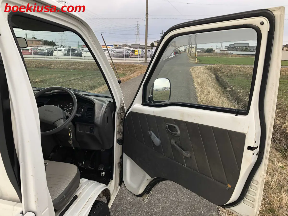 1997 Suzuki Carry 4x4, a white Kei Truck, for sale at Boeki USA in Paterson, NJ (photo 12 of 20)