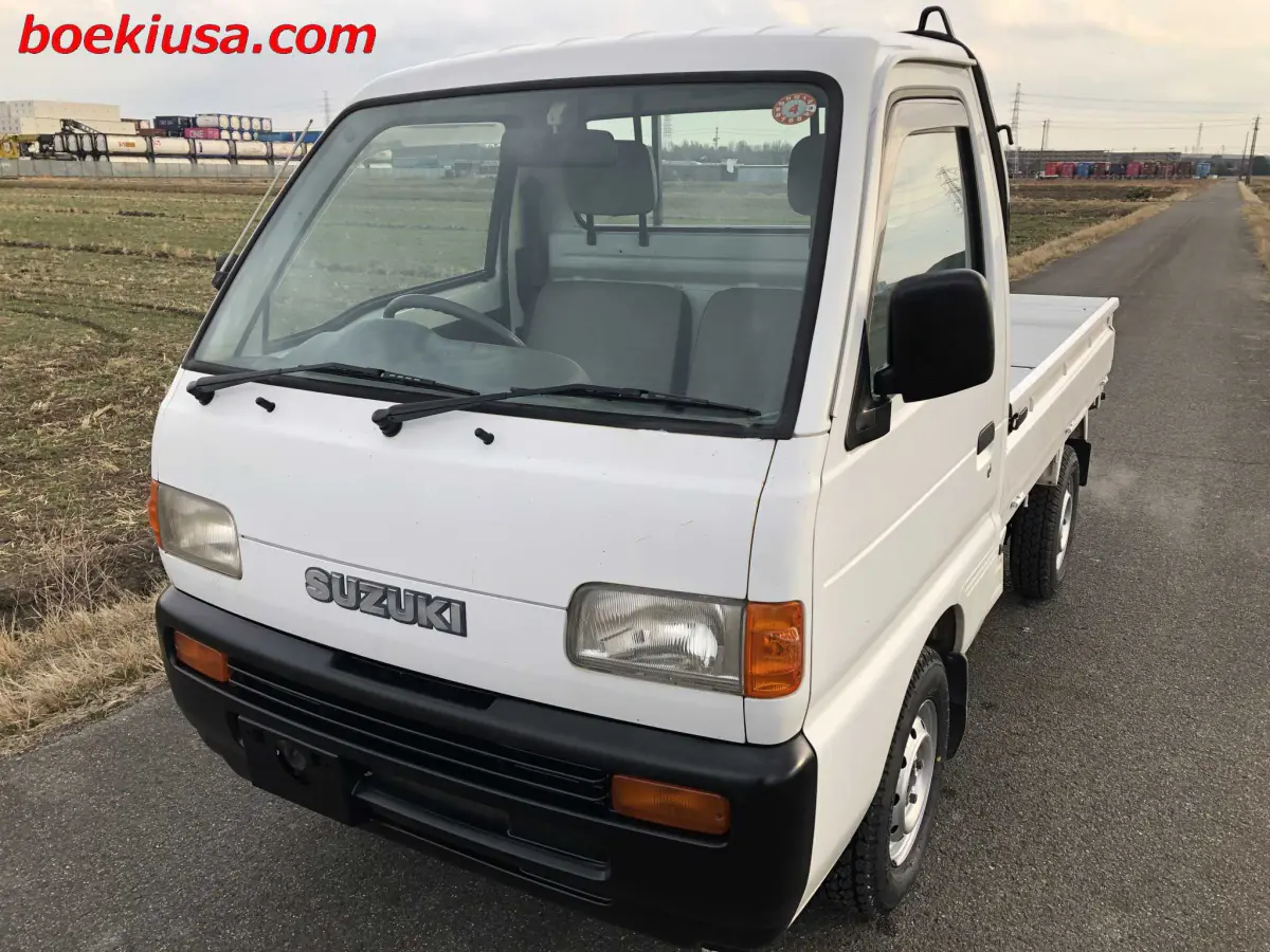 1997 Suzuki Carry 4x4, a white Kei Truck, for sale at Boeki USA in Paterson, NJ (photo 2 of 20)