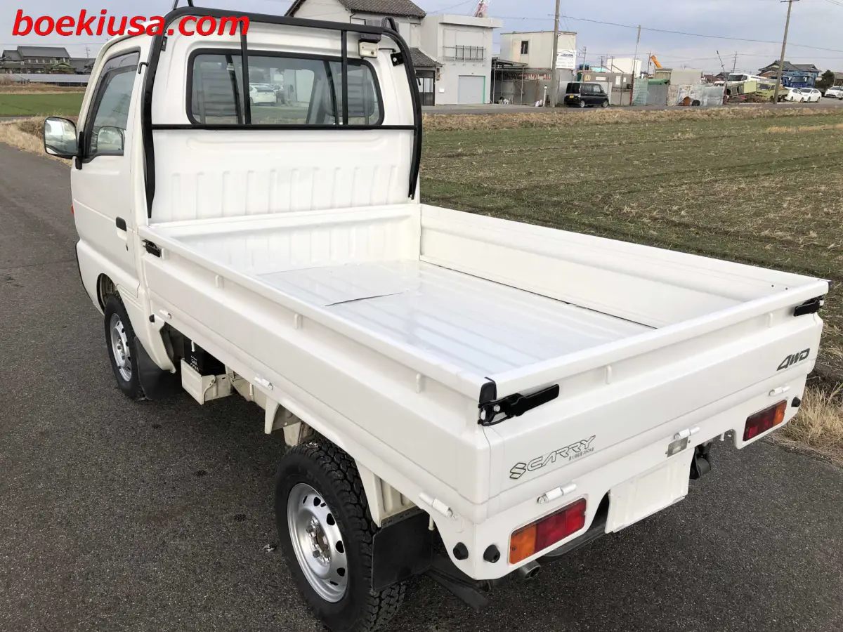 1997 Suzuki Carry 4x4, a white Kei Truck, for sale at Boeki USA in Paterson, NJ (photo 3 of 20)
