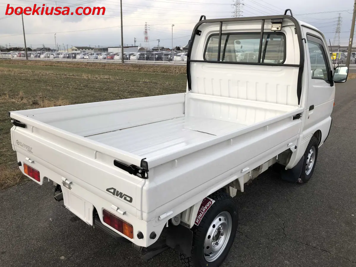1997 Suzuki Carry 4x4, a white Kei Truck, for sale at Boeki USA in Paterson, NJ (photo 4 of 20)