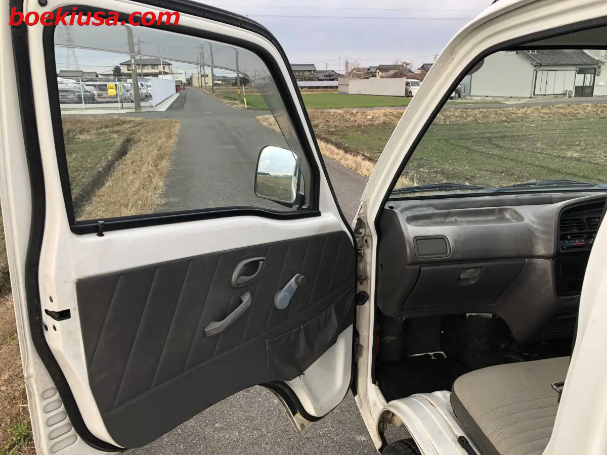 1997 Suzuki Carry 4x4, a white Kei Truck, for sale at Boeki USA in Paterson, NJ (photo 8 of 20)