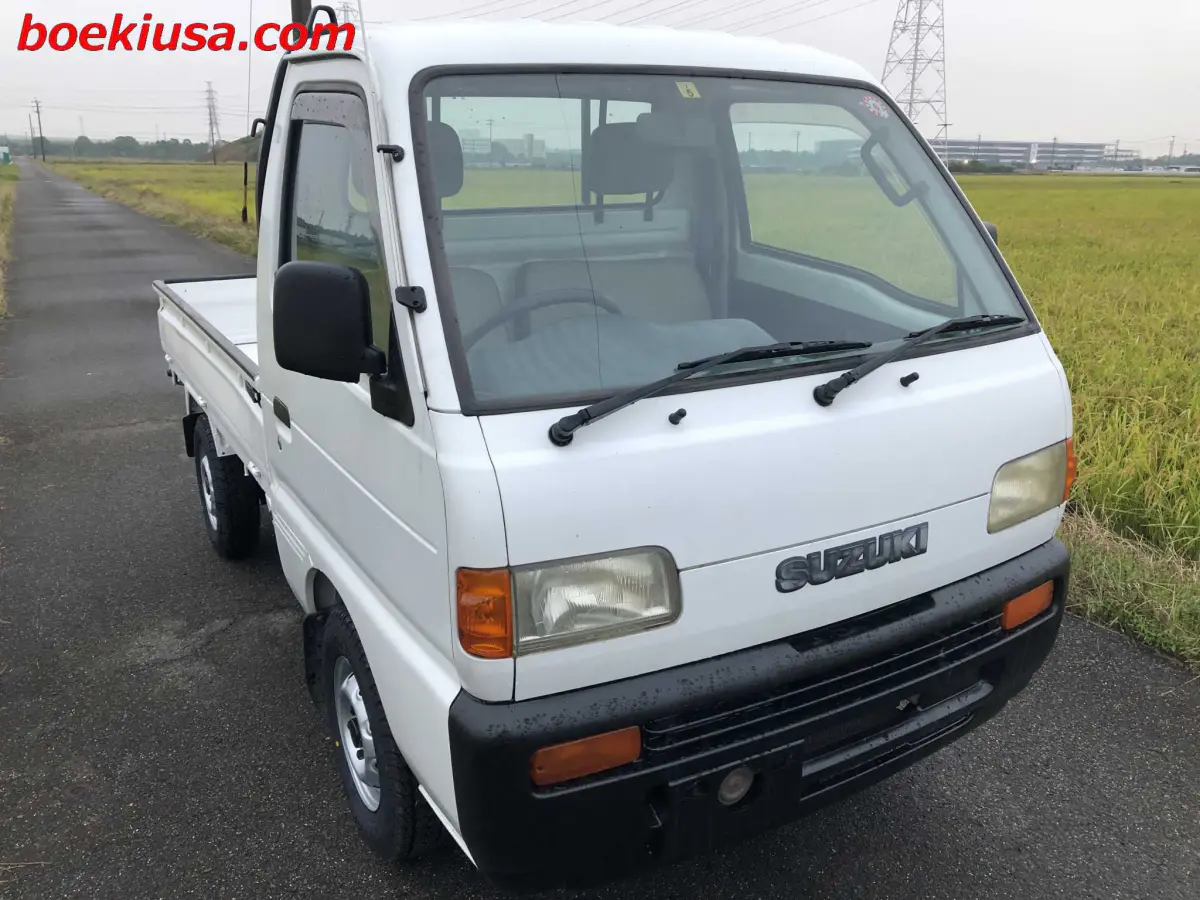 1997 Suzuki Carry 4x4, a white Kei Truck, for sale at Boeki USA in Paterson, NJ (photo 1 of 20)