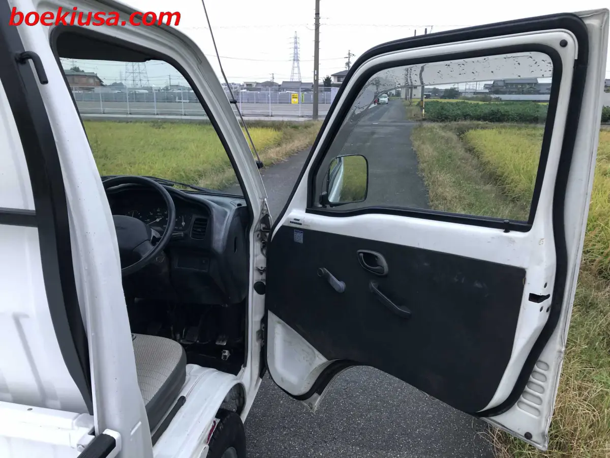 1997 Suzuki Carry 4x4, a white Kei Truck, for sale at Boeki USA in Paterson, NJ (photo 12 of 20)
