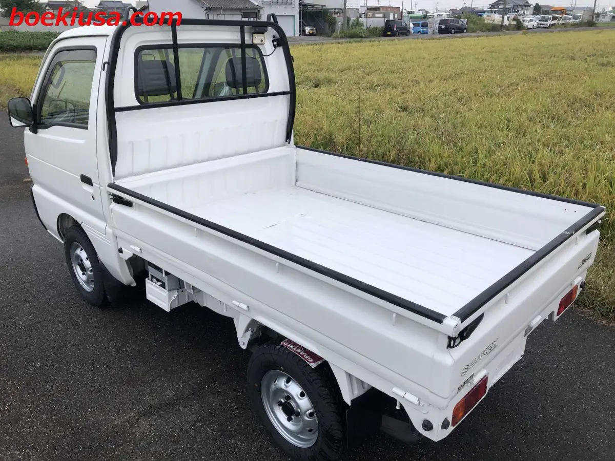 1997 Suzuki Carry 4x4, a white Kei Truck, for sale at Boeki USA in Paterson, NJ (photo 3 of 20)