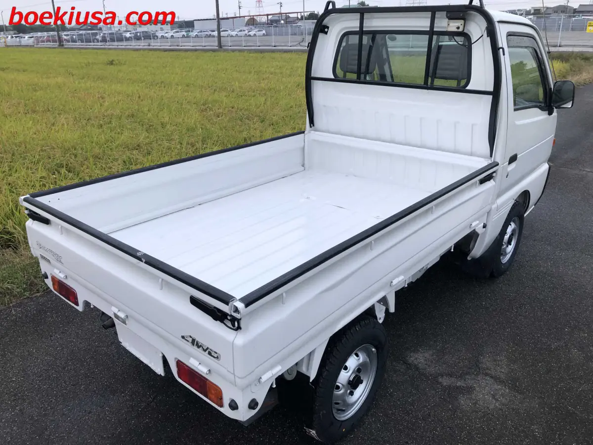 1997 Suzuki Carry 4x4, a white Kei Truck, for sale at Boeki USA in Paterson, NJ (photo 4 of 20)