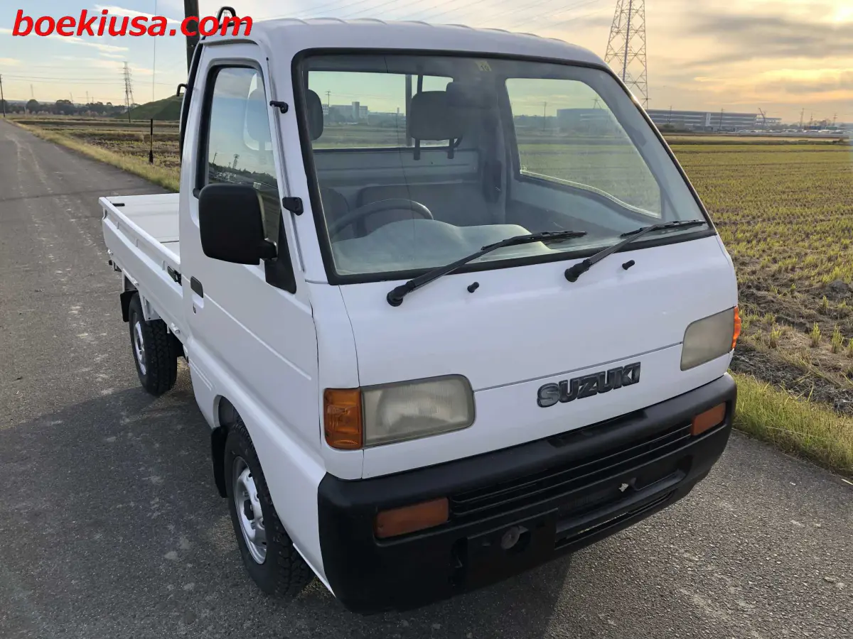 1997 Suzuki Carry 4x4, a white Kei Truck, for sale at Boeki USA in Paterson, NJ (photo 1 of 20)