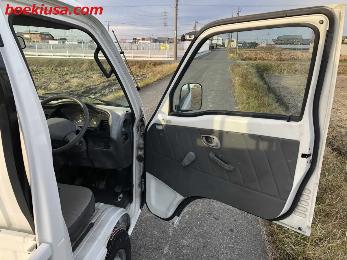 1997 Suzuki Carry 4x4, a white Kei Truck, for sale at Boeki USA in Paterson, NJ (photo 12 of 20)