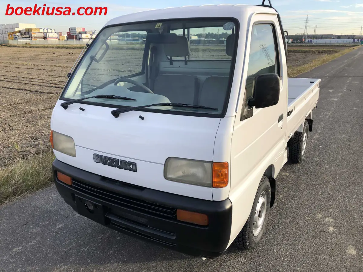 1997 Suzuki Carry 4x4, a white Kei Truck, for sale at Boeki USA in Paterson, NJ (photo 2 of 20)