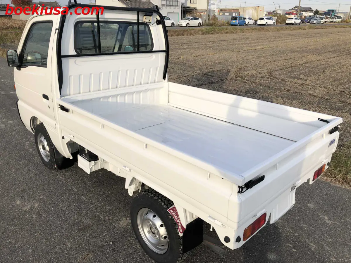 1997 Suzuki Carry 4x4, a white Kei Truck, for sale at Boeki USA in Paterson, NJ (photo 3 of 20)