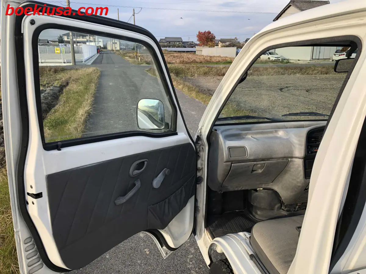1997 Suzuki Carry 4x4, a white Kei Truck, for sale at Boeki USA in Paterson, NJ (photo 8 of 20)
