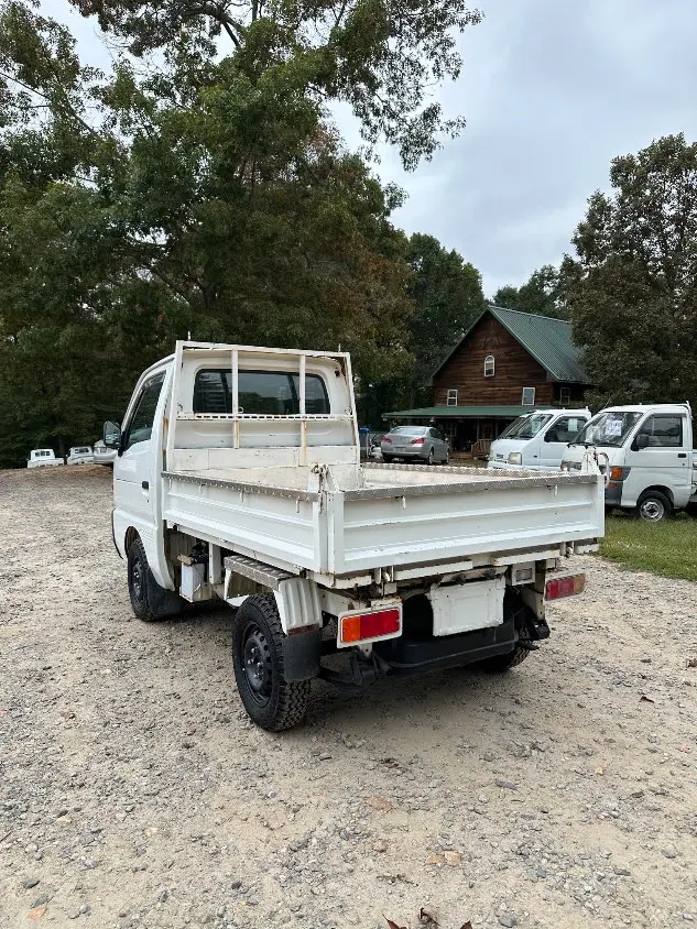 1997 Suzuki Carry Dump 4WD, a white Kei Truck, for sale at Mayberry Mini Trucks in Mount Airy, NC (photo 11 of 20)
