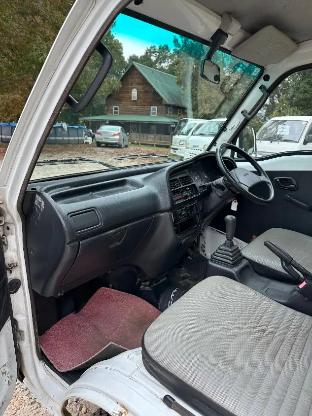 1997 Suzuki Carry Dump 4WD, a white Kei Truck, for sale at Mayberry Mini Trucks in Mount Airy, NC (photo 14 of 20)