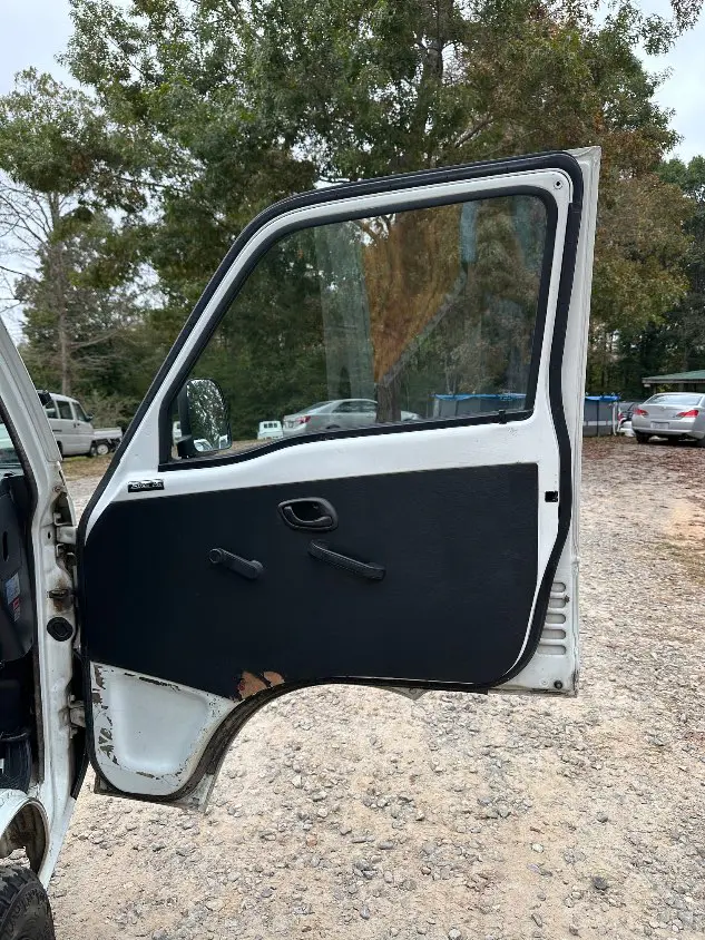 1997 Suzuki Carry Dump 4WD, a white Kei Truck, for sale at Mayberry Mini Trucks in Mount Airy, NC (photo 15 of 20)