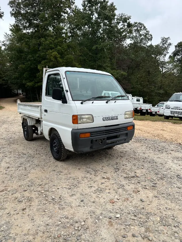 1997 Suzuki Carry Dump 4WD, a white Kei Truck, for sale at Mayberry Mini Trucks in Mount Airy, NC (photo 5 of 20)