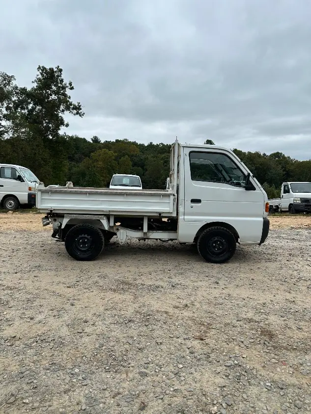 1997 Suzuki Carry Dump 4WD, a white Kei Truck, for sale at Mayberry Mini Trucks in Mount Airy, NC (photo 6 of 20)