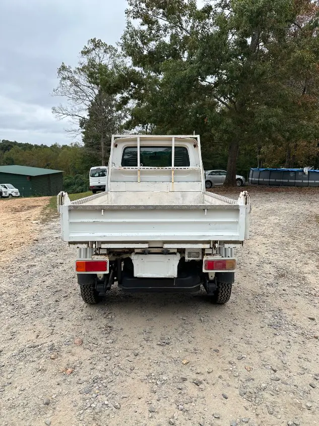 1997 Suzuki Carry Dump 4WD, a white Kei Truck, for sale at Mayberry Mini Trucks in Mount Airy, NC (photo 8 of 20)