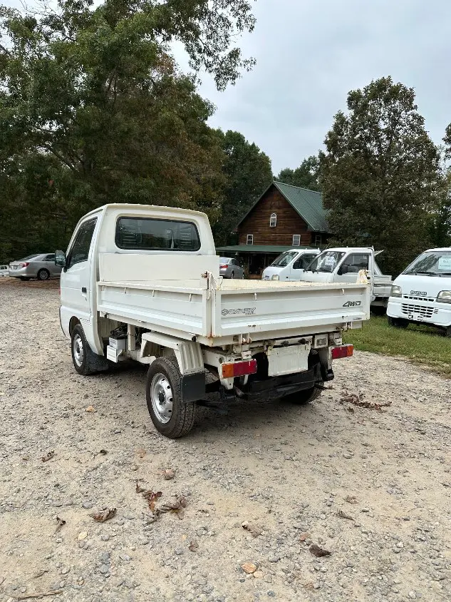 1997 Suzuki Carry Dump 4WD, a white Kei Truck, for sale at Mayberry Mini Trucks in Mount Airy, NC (photo 12 of 20)