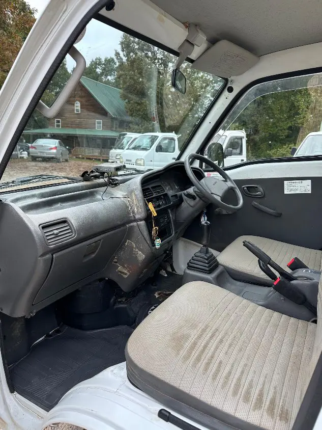 1997 Suzuki Carry Dump 4WD, a white Kei Truck, for sale at Mayberry Mini Trucks in Mount Airy, NC (photo 15 of 20)