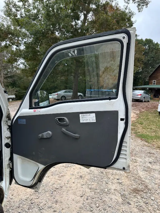 1997 Suzuki Carry Dump 4WD, a white Kei Truck, for sale at Mayberry Mini Trucks in Mount Airy, NC (photo 16 of 20)