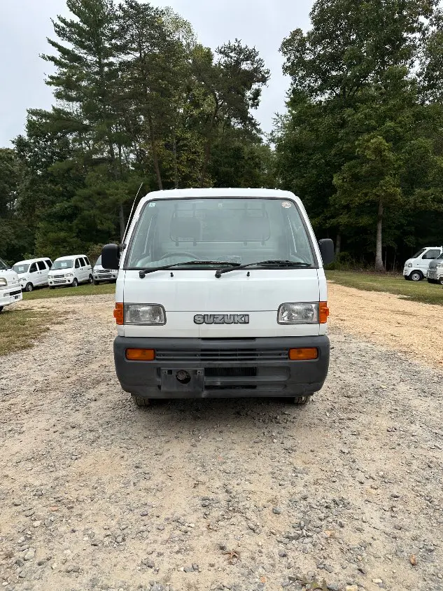 1997 Suzuki Carry Dump 4WD, a white Kei Truck, for sale at Mayberry Mini Trucks in Mount Airy, NC (photo 4 of 20)