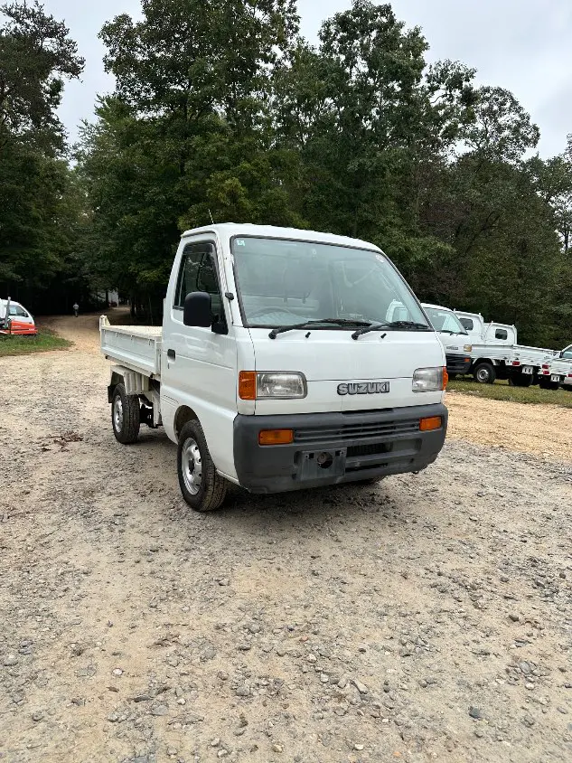 1997 Suzuki Carry Dump 4WD, a white Kei Truck, for sale at Mayberry Mini Trucks in Mount Airy, NC (photo 5 of 20)