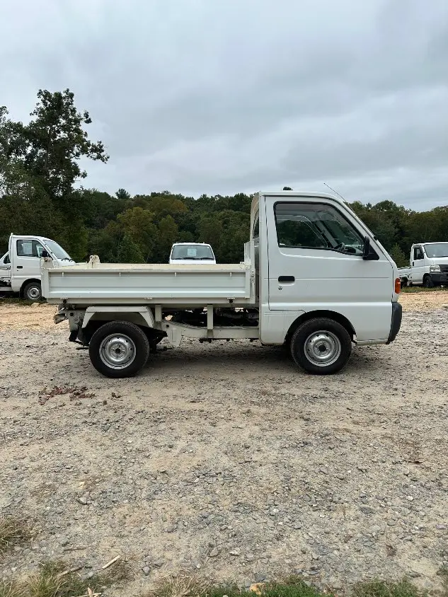 1997 Suzuki Carry Dump 4WD, a white Kei Truck, for sale at Mayberry Mini Trucks in Mount Airy, NC (photo 6 of 20)