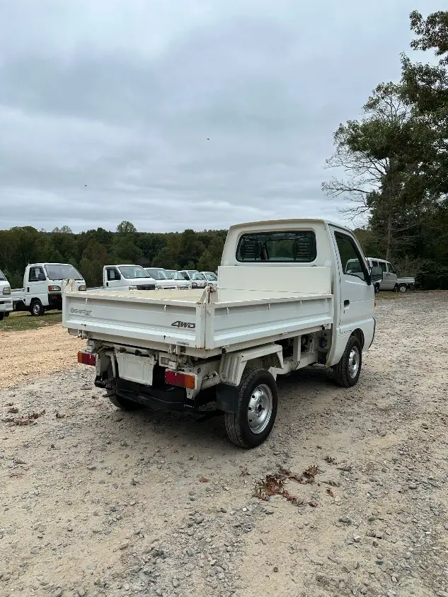 1997 Suzuki Carry Dump 4WD, a white Kei Truck, for sale at Mayberry Mini Trucks in Mount Airy, NC (photo 7 of 20)