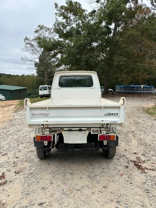 1997 Suzuki Carry Dump 4WD, a white Kei Truck, for sale at Mayberry Mini Trucks in Mount Airy, NC (photo 8 of 20)