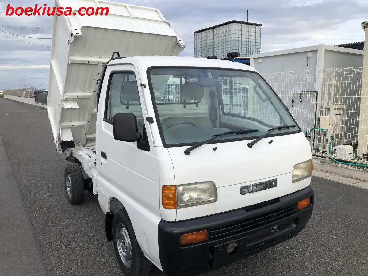1997 Suzuki Carry Dump 4x4, a white Kei Truck, for sale at Boeki USA in Paterson, NJ (photo 1 of 20)