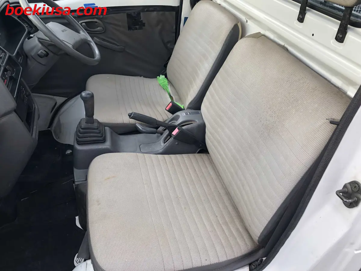 1997 Suzuki Carry Dump 4x4, a white Kei Truck, for sale at Boeki USA in Paterson, NJ (photo 10 of 20)