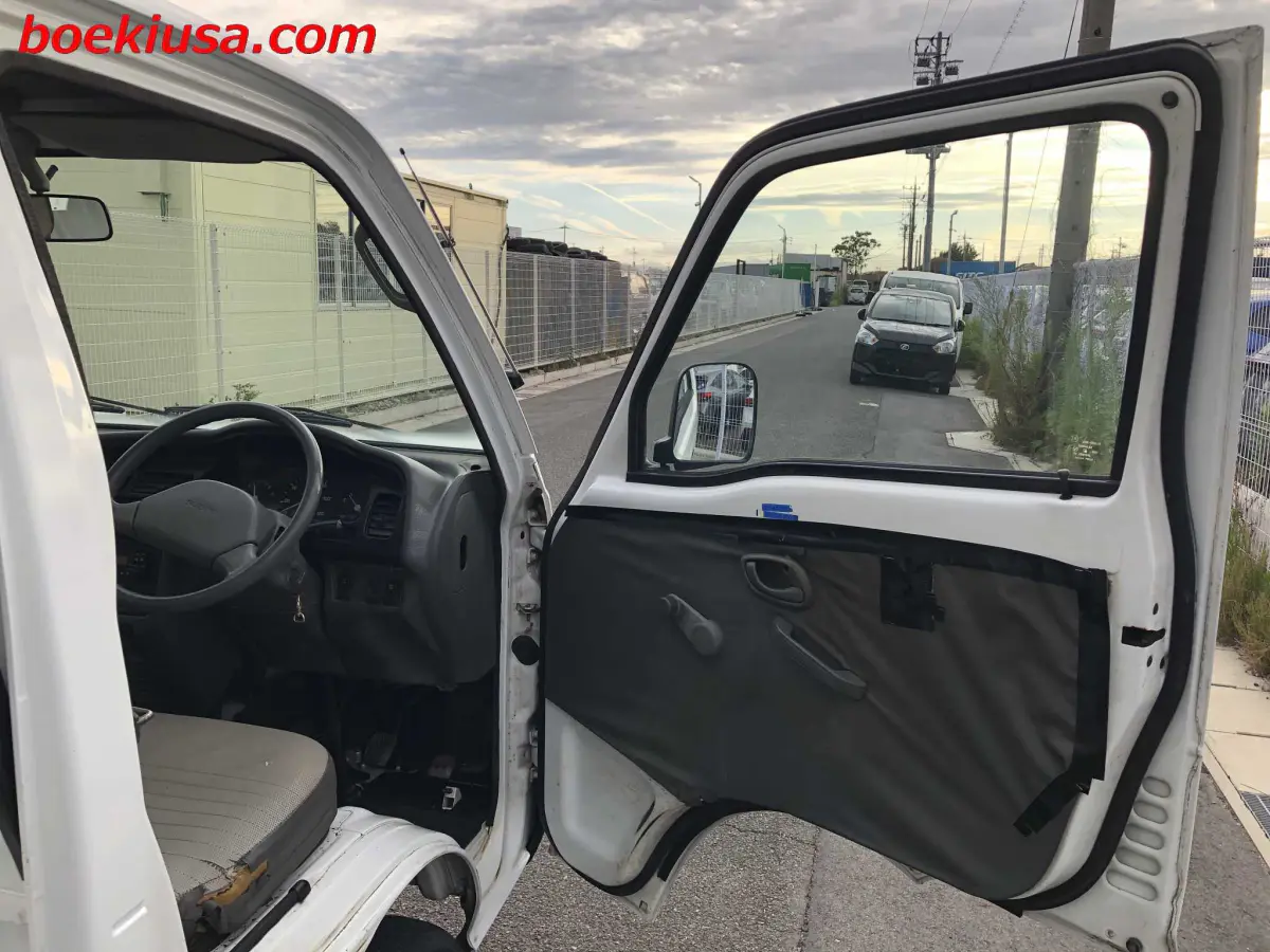 1997 Suzuki Carry Dump 4x4, a white Kei Truck, for sale at Boeki USA in Paterson, NJ (photo 12 of 20)