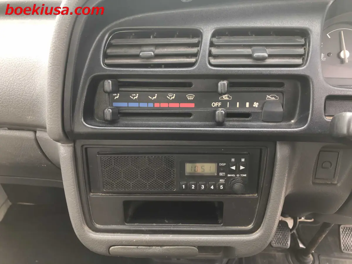 1997 Suzuki Carry Dump 4x4, a white Kei Truck, for sale at Boeki USA in Paterson, NJ (photo 17 of 20)