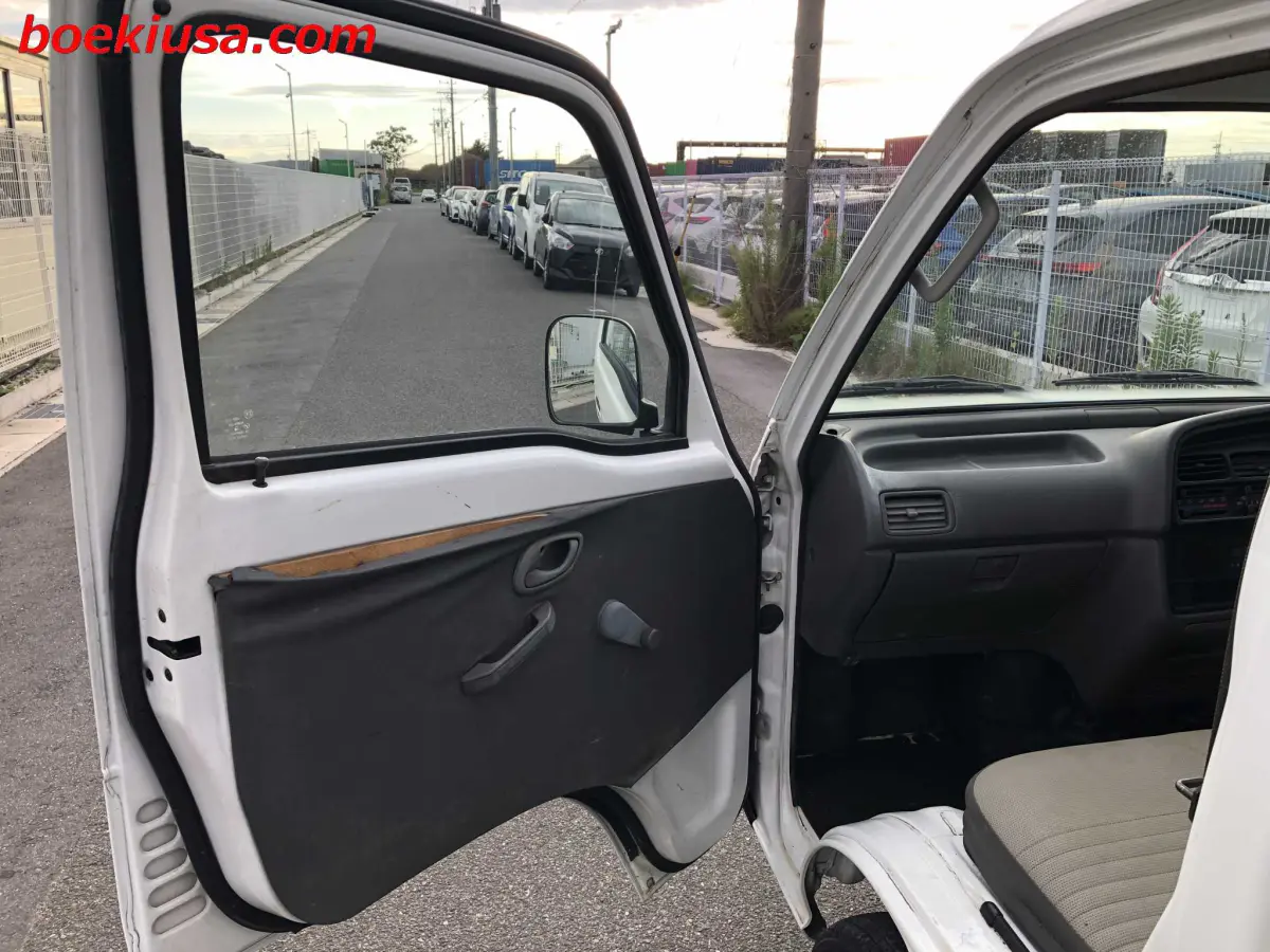 1997 Suzuki Carry Dump 4x4, a white Kei Truck, for sale at Boeki USA in Paterson, NJ (photo 8 of 20)