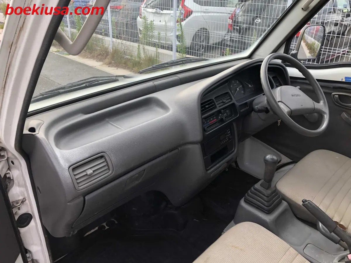 1997 Suzuki Carry Dump 4x4, a white Kei Truck, for sale at Boeki USA in Paterson, NJ (photo 9 of 20)