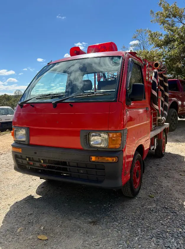 1998 Daihatsu Hijet 4WD, a red Kei Truck, for sale at Mayberry Mini Trucks in Mount Airy, NC (photo 1 of 17)