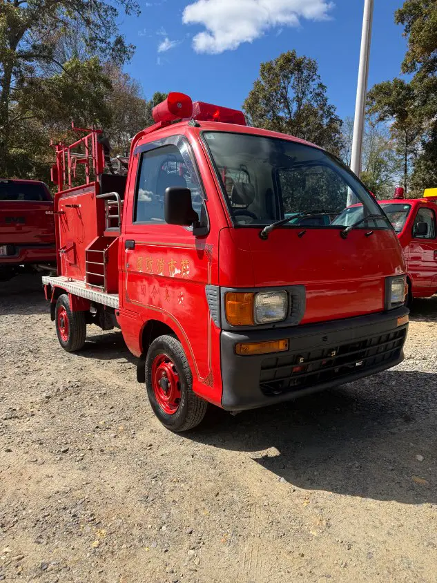 1998 Daihatsu Hijet 4WD, a red Kei Truck, for sale at Mayberry Mini Trucks in Mount Airy, NC (photo 3 of 17)