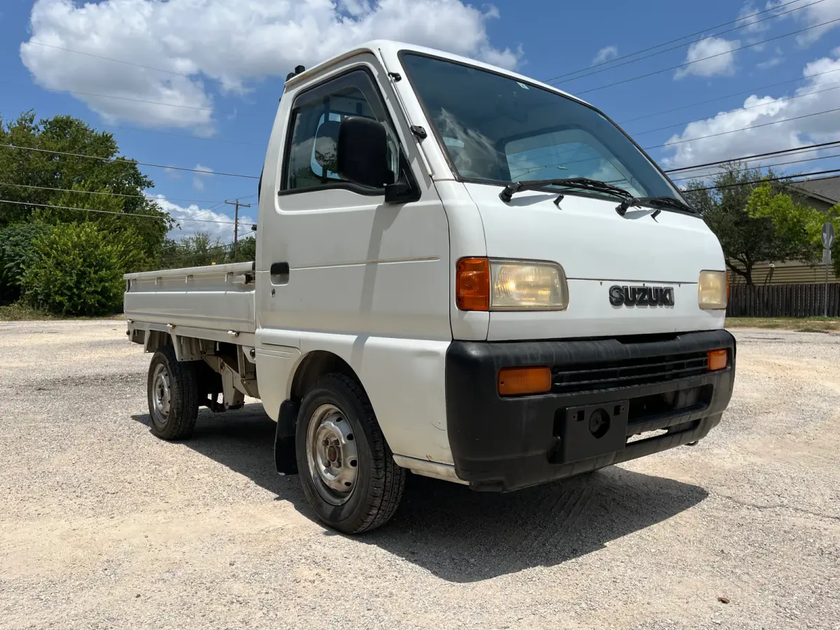 1998 Suzuki Carry, 2WD, a Kei Truck, for sale at Sunshine Imports in Austin, TX (photo 1 of 13)