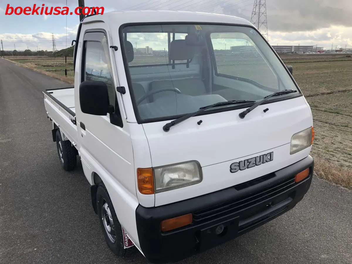 1998 Suzuki Carry 4x4, a white Kei Truck, for sale at Boeki USA in Paterson, NJ (photo 1 of 20)