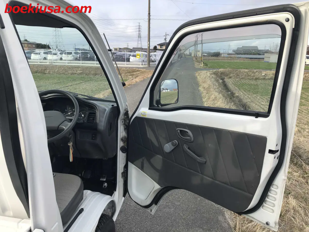 1998 Suzuki Carry 4x4, a white Kei Truck, for sale at Boeki USA in Paterson, NJ (photo 12 of 20)