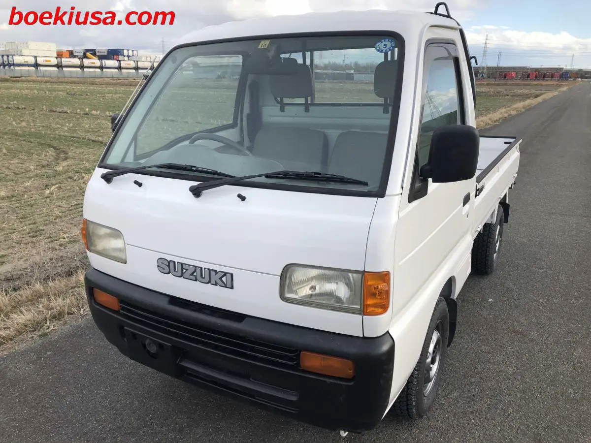 1998 Suzuki Carry 4x4, a white Kei Truck, for sale at Boeki USA in Paterson, NJ (photo 2 of 20)