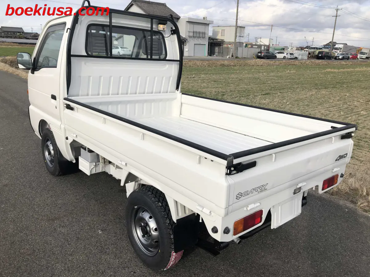 1998 Suzuki Carry 4x4, a white Kei Truck, for sale at Boeki USA in Paterson, NJ (photo 3 of 20)