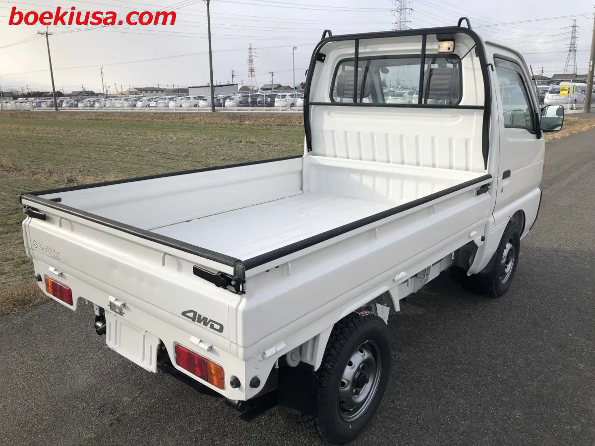 1998 Suzuki Carry 4x4, a white Kei Truck, for sale at Boeki USA in Paterson, NJ (photo 4 of 20)